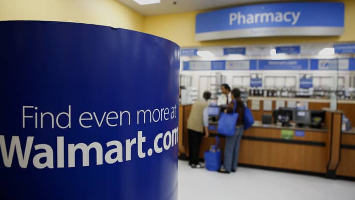 Signage points customers to Walmart.com at the pharmacy