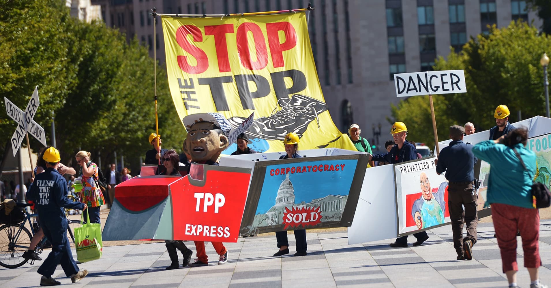 Demonstrators protesting against the Trans-Pacific Partnership are seen on Pennsylvania Avenue, in Washington, D.C.