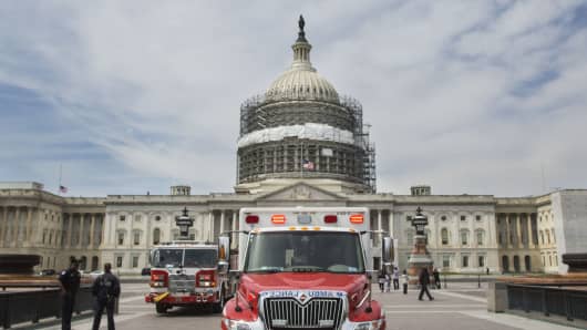 A Washington D.C. Firetruck and Ambulance respond to a call on the east front of the U.S. Capitol in Washington, Wednesday, March 23, 2016.