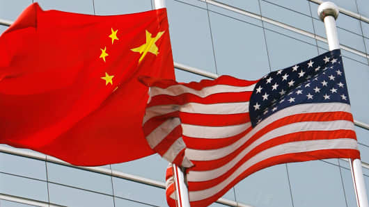 The flags of United States and China outside a commercial building in Beijing, China, on July 09, 2007.