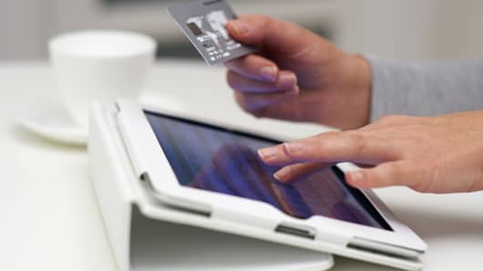 Online Shopping on tablet with credit card