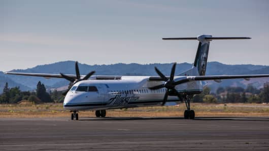 An Alaska Airlines Bombardier Q-400 regional turbo prop plane