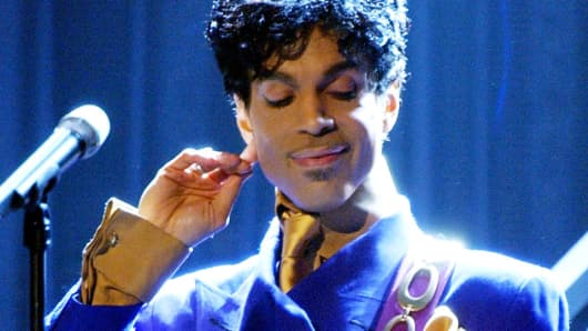Prince performs 'Purple Rain' in Los Angeles, Feb. 8, 2004.