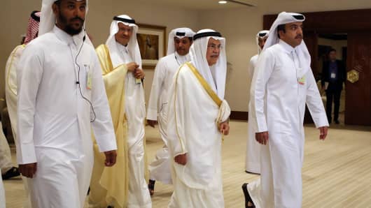Saudi Oil Minister Ali al-Naimi, center right, arrives at an oil-producers' meeting in Doha, Qatar, on Sunday, April 17, 2016.