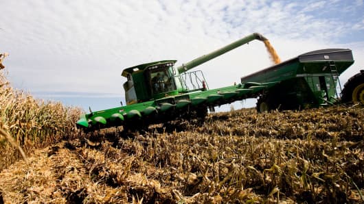 A farmer unloads harvested corn in Marshall, Missouri.