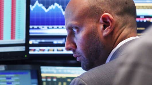 A trader works on the floor of the New York Stock Exchange on August 24, 2015 in New York City.