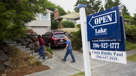 Potential homebuyers attend an open house in Seattle.