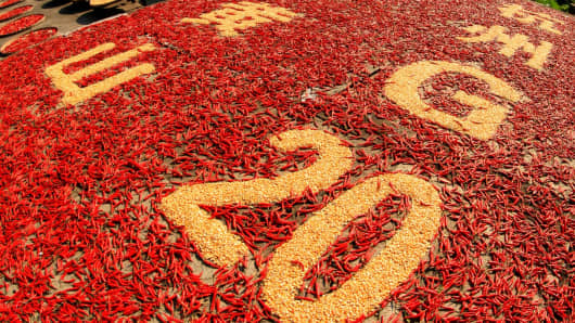 Farmers make a pattern of '2016 G20 Summit' with crops at Chengkan Village in Huizhou District on August 29, 2016 in Huangshan, Anhui Province.