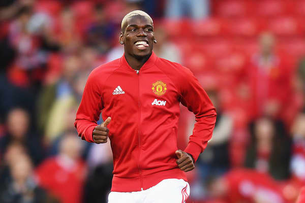Paul Pogba of Manchester United warms up prior to the Premier League match between Manchester United and Southampton at Old Trafford on August 19, 2016 in Manchester, England.