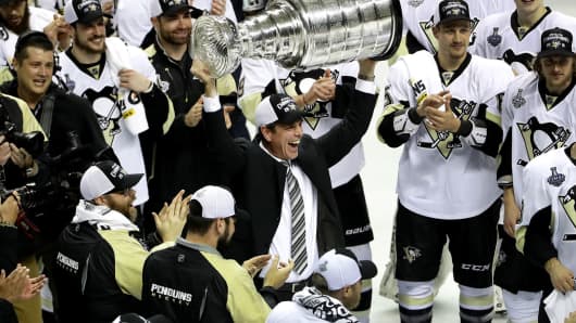 Mike Sullivan of the Pittsburgh Penguins celebrates their Stanley Cup win against the San Jose Sharks in Game 6 of the 2016 NHL Stanley Cup Final on June 12, 2016.