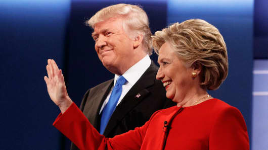 Republican presidential candidate Donald Trump, left, stands with Democratic presidential candidate Hillary Clinton before the first presidential debate at Hofstra University, Monday, Sept. 26, 2016, in Hempstead, N.Y.