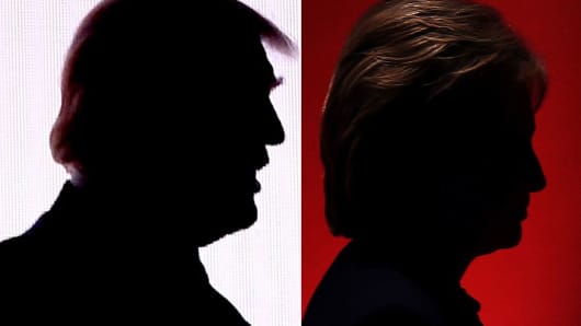 Silhouettes of Republican presidential nominee Donald Trump and Democratic presidential nominee Hillary Clinton