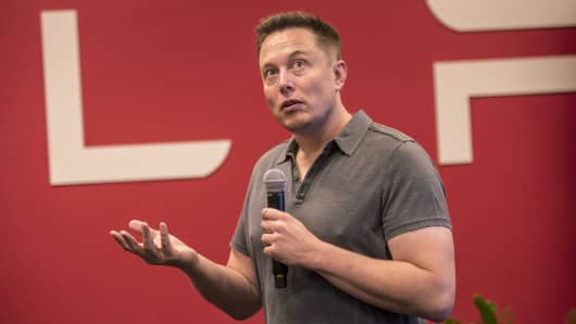 Elon Musk, chairman and chief executive officer of Tesla Motors, speaks during an event at the company's headquarters in Palo Alto, California.
