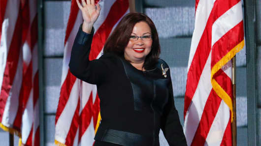 Rep. Tammy Duckworth, D-Ill., waves to delegates during the final day of the Democratic National Convention in Philadelphia , Thursday, July 28, 2016.
