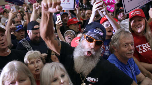 Supporters cheer for Republican presidential nominee Donald Trump during a campaign rally in the Special Events Center on the Florida State Fairgrounds November 5, 2016 in Tampa, Florida.