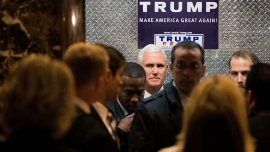 Vice President-elect Mike Pence gets into an elevator as he arrives at Trump Tower, November 15, 2016, in New York City.