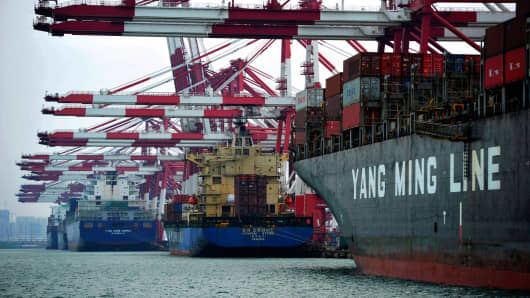 Cargo ships berth at a port in Qingdao, east China's Shandong province.