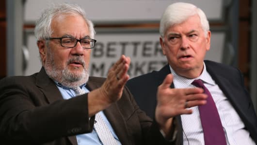 Former Rep. Barney Frank (D-Mass.) (L) and former Sen. Chris Dodd (D-Conn.) talk about their hallmark and namesake legislation, the Dodd-Frank Wall Street reform law, on the fifth anniversary of the law at the Newseum July 20, 2015, in Washington.