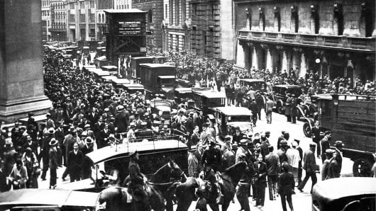 Crowds gather outside the New York Stock Exchange during the Wall Street crash in 1929.