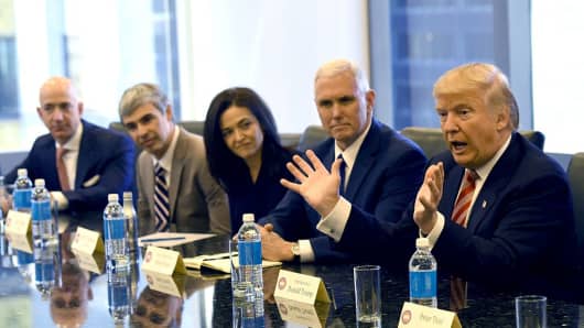 (L-R) Amazon's chief Jeff Bezos, Larry Page of Alphabet, Facebook COO Sheryl Sandberg, Vice President-elect Mike Pence and President-elect Donald Trump at Trump Tower December 14, 2016.
