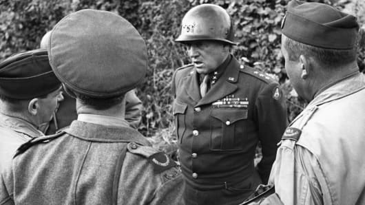 American General George S. Patton talks to Allied war correspondents in Normandy, France, in 1944.