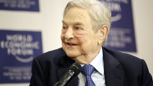 George Soros, billionaire and founder of Soros Fund Management LLC, looks on during an interview at the World Economic Forum (WEF) in Davos, Switzerland, on Thursday, Jan. 21, 2016.