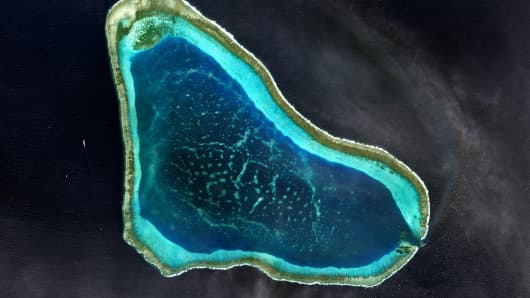 Satellite image of the Scarborough Shoal in the South China Sea, a fishing-rich area claimed by both Manila and Beijing, on 12 January 2017.