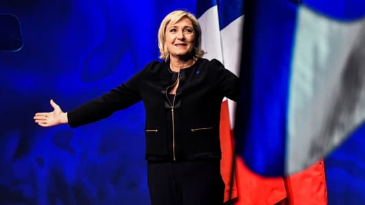 French presidential candidate and head of the far-right National Front party Marine Le Pen arrives on stage to give a speech on February 5, 2017.