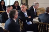 Virginia Governor Terry McAuliffe waits to hear US President Donald Trump speak to members of the National Governors Association and his administration before a meeting in the State Dining Room of the White House on February 27, 2017 in Washington, DC.