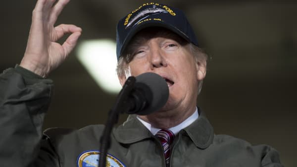 President Donald Trump speaks aboard the pre-commissioned USS Gerald R. Ford aircraft carrier in Newport News, Virginia, March 2, 2017.