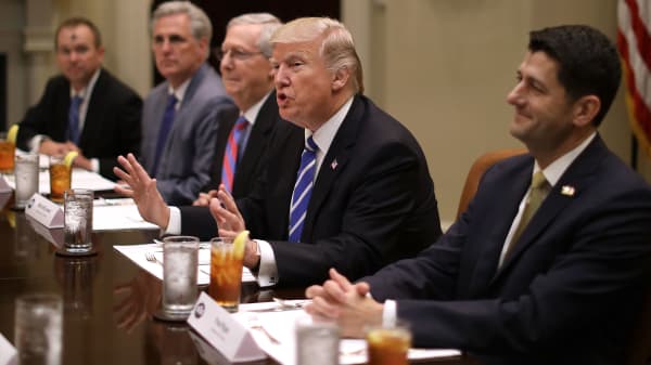 President Donald Trump (C) hosts Republican Congressional leaders (2nd L-R) Rep. Kevin McCarthy (R-CA); Senate Majority Leader Mitch McConnell (R-KY), Speaker of the House Paul Ryan (R-WI) and others during a working lunch in the Roosevelt Room at the White House March 1, 2017 in Washington, DC.