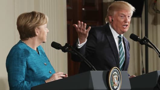President Donald Trump (R) holds a joint press conference with German Chancellor Angela Merkel in the East Room of the White House on March 17, 2017 in Washington, DC.