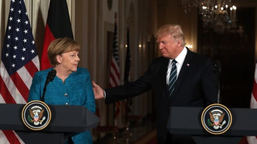 U.S. President Donald Trump (R) holds a joint press conference with German Chancellor Angela Merkel in the East Room of the White House on March 17, 2017.