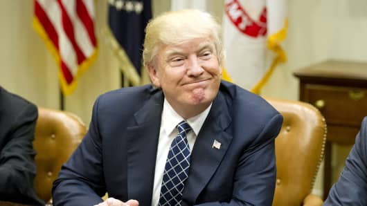 President Donald Trump smiles during a listening session the Roosevelt Room of the White House in Washington, D.C.
