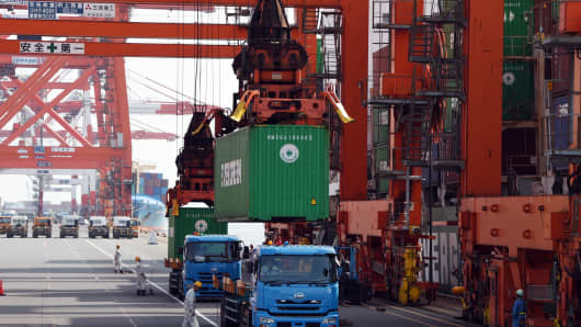 Containers loaded onto a freighter at a pier of Tokyo port in Japan.