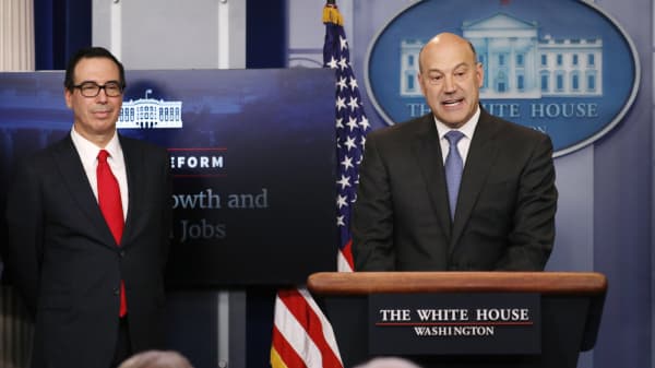 U.S. National Economic Director Gary Cohn (R) and Treasury Secretary Steven Mnuchin unveil the Trump administration's tax reform proposal in the White House briefing room in Washington, U.S, April 26, 2017.
