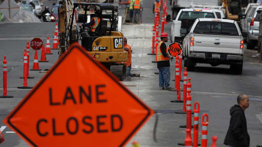 Construction crews conduct repairs on Broadway Street in San Francisco.