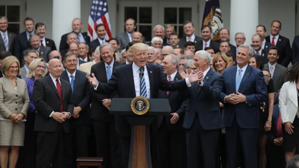 President Donald Trump (C) gathers with Congressional Republicans in the Rose Garden of the White House after the House of Representatives approved the American Healthcare Act, to repeal major parts of Obamacare and replace it with the Republican healthcare plan, in Washington, U.S., May 4, 2017.