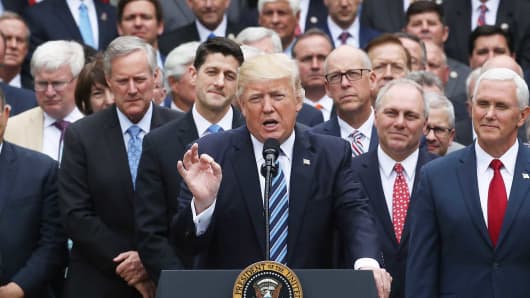President Donald Trump speaks while flanked by House Republicans after they passed legislation aimed at repealing and replacing Obamacare, during an event in the Rose Garden at the White House, on May 4, 2017 in Washington, DC.