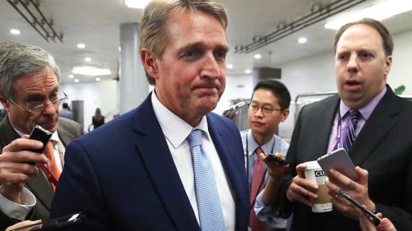 Sen. Jeff Flake, R-Ariz., speaks to reporters about President Donald Trump's firing of FBI Director James Comey, on Capitol Hill, Washington, May 10, 2017.