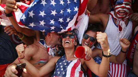 U.S. supporters celebrate after their loss to Germany after watching the match at FIFA Fan Fest on June 26, 2014 in Rio de Janeiro, Brazil. 