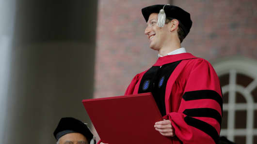 Facebook founder Mark Zuckerberg holds his honorary Doctor of Laws degree during the 366th Commencement Exercises at Harvard University in Cambridge, Massachusetts, U.S., May 25, 2017.