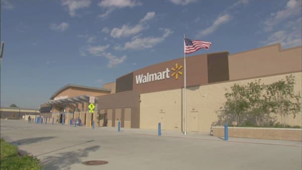 Walmart is accused of punishing workers for sick days