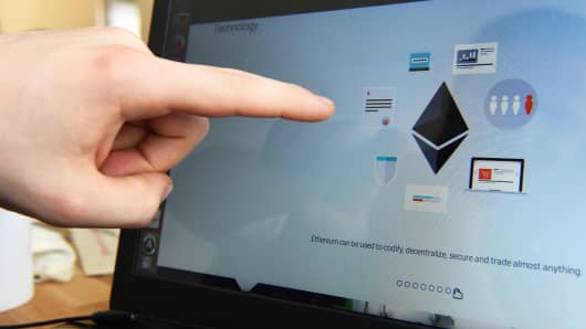 The technology of the Ethereum platform is represented on a computer screen at the Ethereum DEV offices in Berlin, Germany, 14 April 2015. Ethereum is an open source platform that hosts applications and data on a decentralized network.