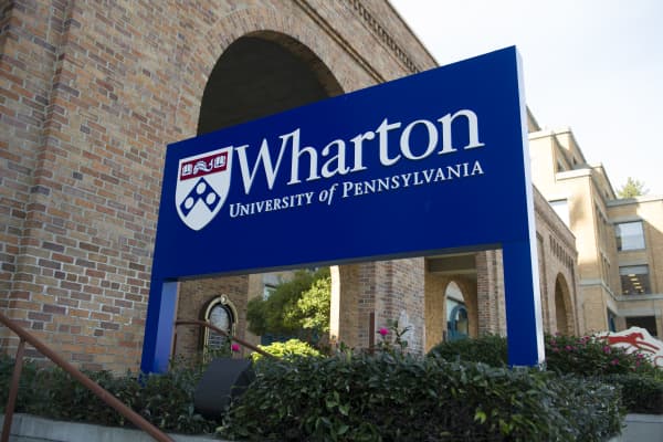 Signage for the University of Pennsylvania's Wharton School stands outside of the new campus in San Francisco, California.