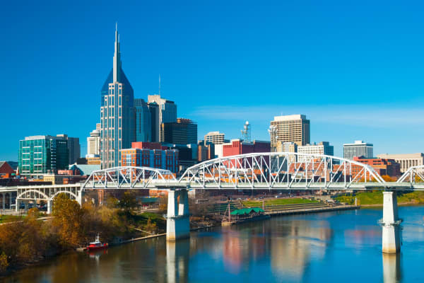 Downtown Nashville skyline with the Shelby Street bridge and the Cumberland River.