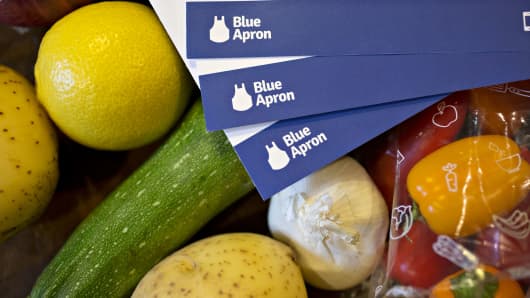 Recipe cards from a Blue Apron Holdings Inc. meal-kit delivery are arranged for a photograph in Tiskilwa, Illinois, U.S., on Wednesday, June 14, 2017.