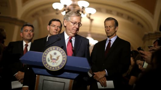 Senate Majority Leader Mitch McConnell (R-KY) (C) talks to reporters with (L-R) Sen. Cory Gardner (R-CO), Sen. John Barrosso (R-WY) and Sen. John Thune (R-SD) following their party's weekly policy luncheon at the U.S. Capitol May 16, 2017 in Washington, DC.