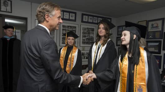 Tennessee Governor Bill Haslam shaking hands with a student at the Cleveland State Community College graduation May 6, 2017.
