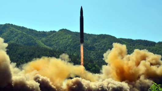 This picture taken on July 4, 2017 and released by North Korea's official Korean Central News Agency (KCNA) on July 5, 2017 shows the successful test-fire of the intercontinental ballistic missile Hwasong-14 at an undisclosed location.